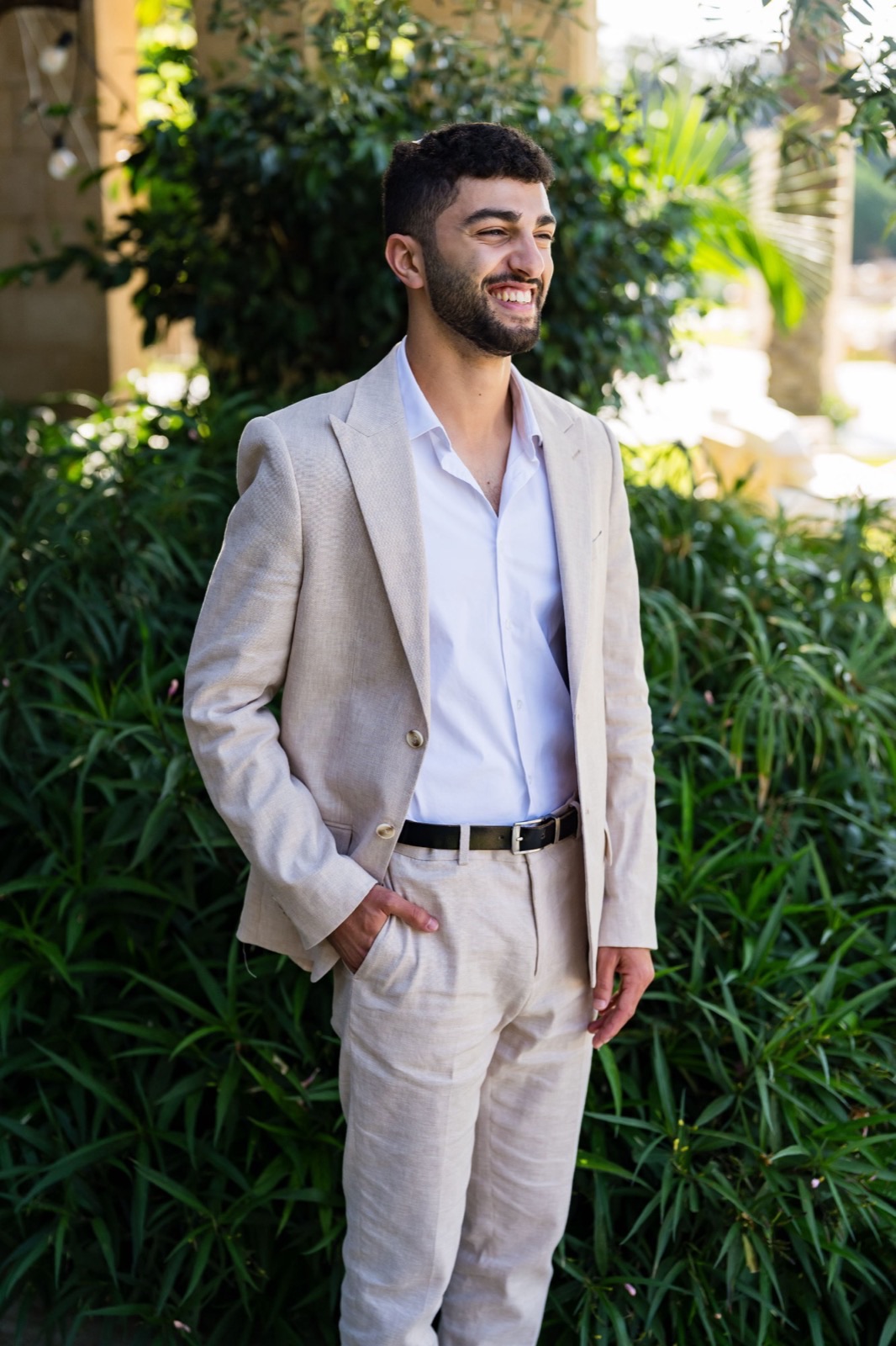 Shaked Ben Dor in a light suit